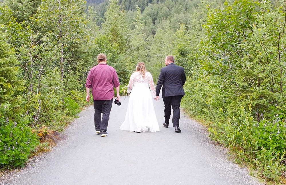 Adam Reynolds walking with couple in Juneau Alaska